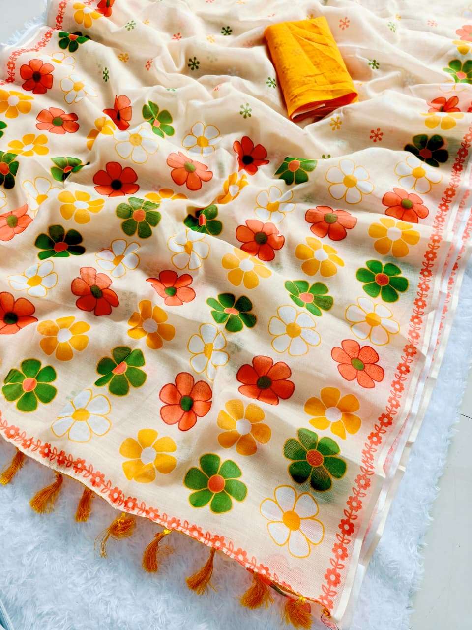 rudraksh sunbun pure and soft linen fabric with beautiful and fancy floral digital print in saree saree with tussels rudraksh sunbun pure and soft linen fabric with beautiful and fancy floral digital print in saree saree with tussels