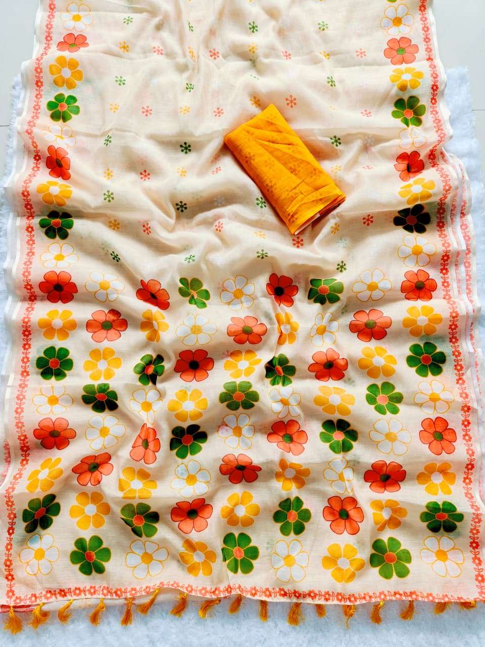 rudraksh sunbun pure and soft linen fabric with beautiful and fancy floral digital print in saree saree with tussels rudraksh sunbun pure and soft linen fabric with beautiful and fancy floral digital print in saree saree with tussels