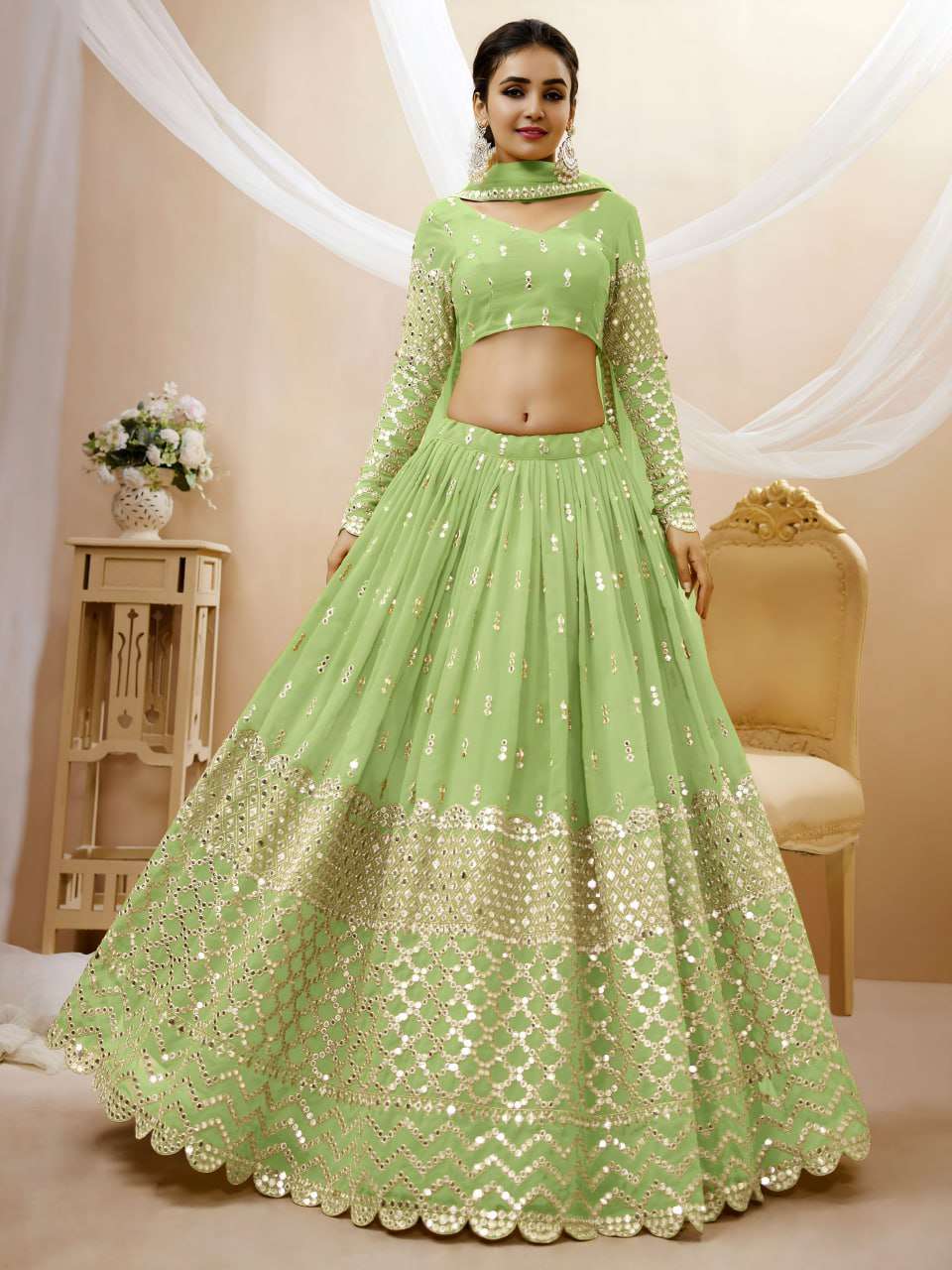 rudraksh a soft pistachio green georgette fabric adorned with delicate zari and sequin butti work sequin work lehenga choli rudraksh a soft pistachio green georgette fabric adorned with delicate zari and sequin butti work sequin work lehenga choli