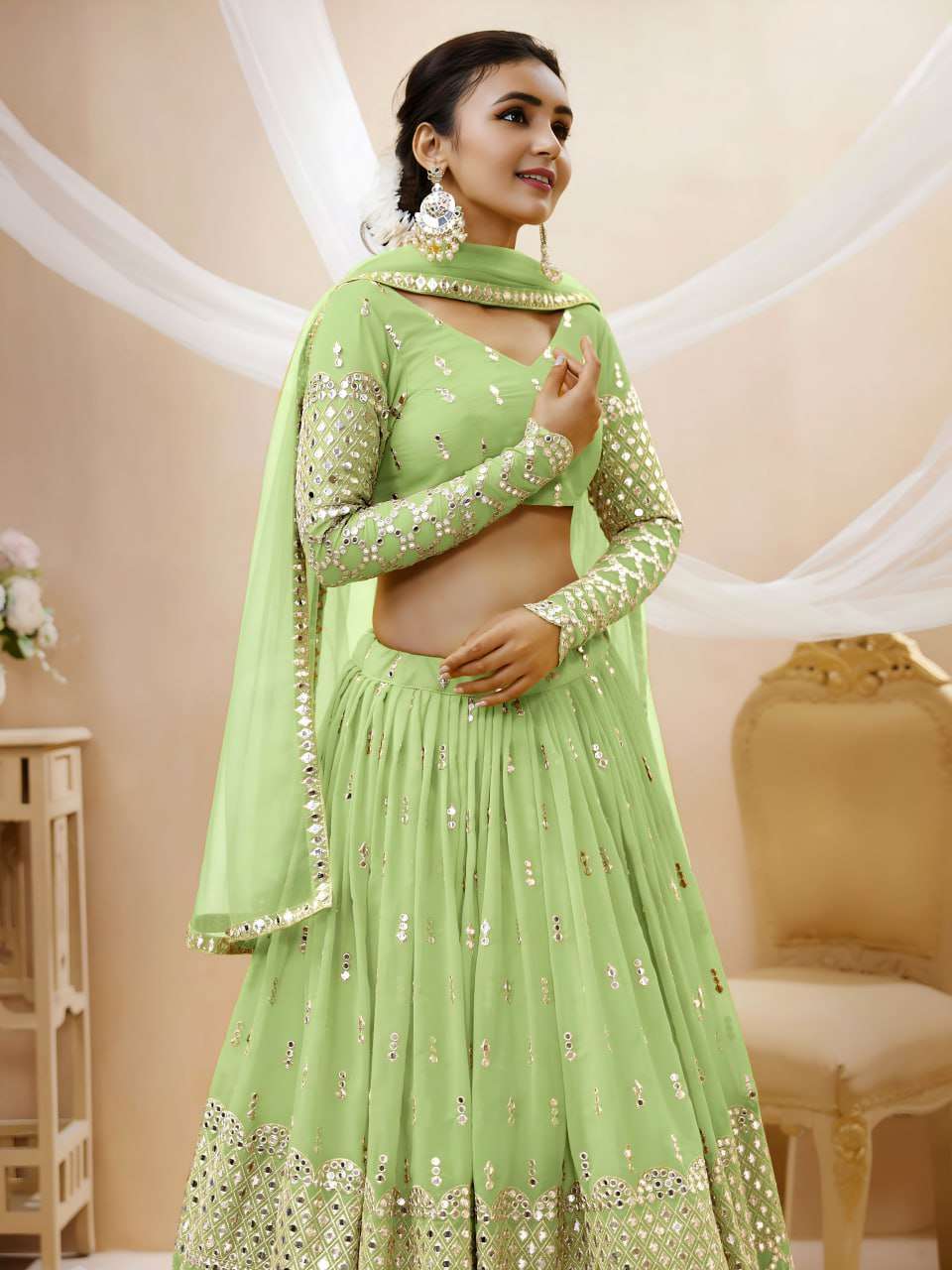 rudraksh a soft pistachio green georgette fabric adorned with delicate zari and sequin butti work sequin work lehenga choli rudraksh a soft pistachio green georgette fabric adorned with delicate zari and sequin butti work sequin work lehenga choli