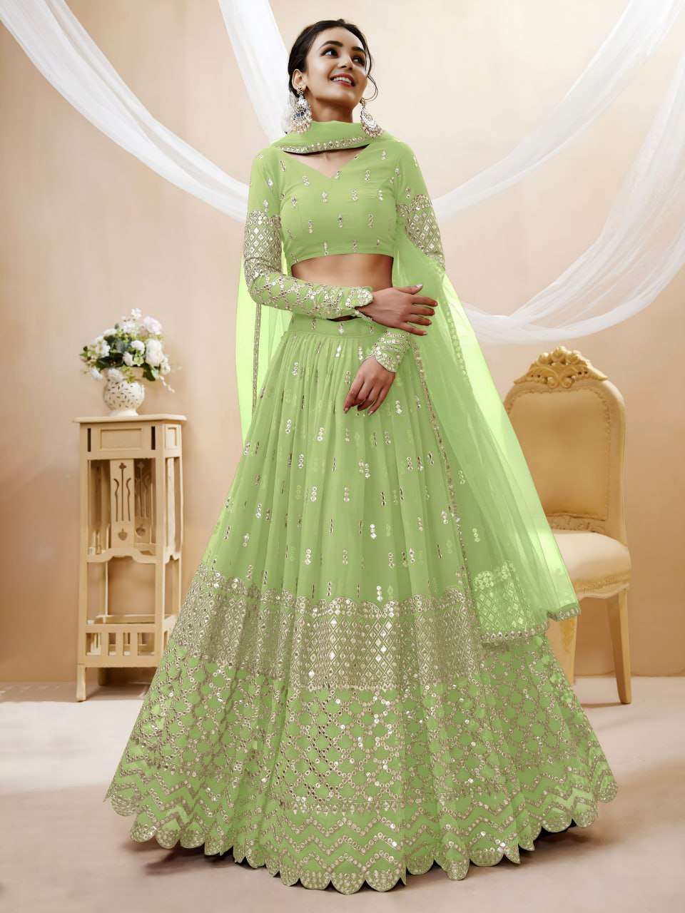rudraksh a soft pistachio green georgette fabric adorned with delicate zari and sequin butti work sequin work lehenga choli rudraksh a soft pistachio green georgette fabric adorned with delicate zari and sequin butti work sequin work lehenga choli
